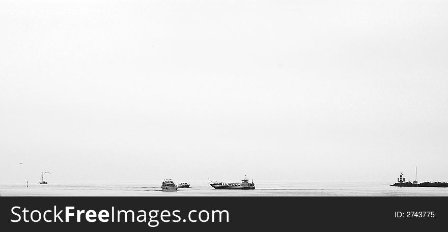 Boats on the IJsselmeer in the Netherlands, in black and white. Boats on the IJsselmeer in the Netherlands, in black and white