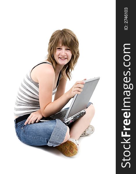 Teen girl is smiling with computer. Teen girl is smiling with computer