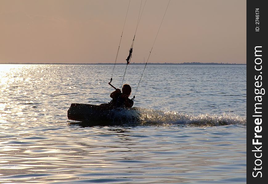 Silhouettes Kitesurf On A Gulf