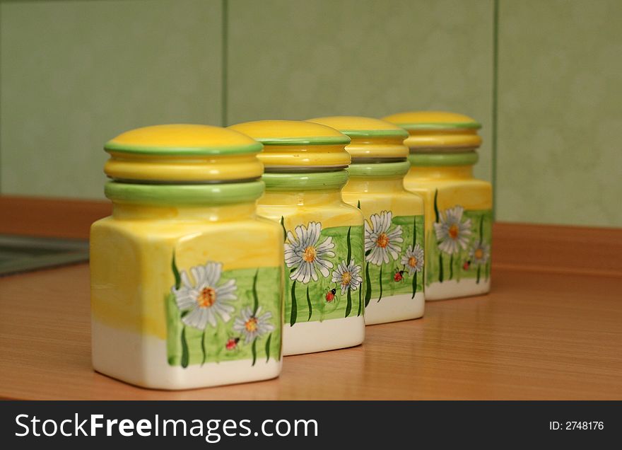 Yellow set for spices from four jars