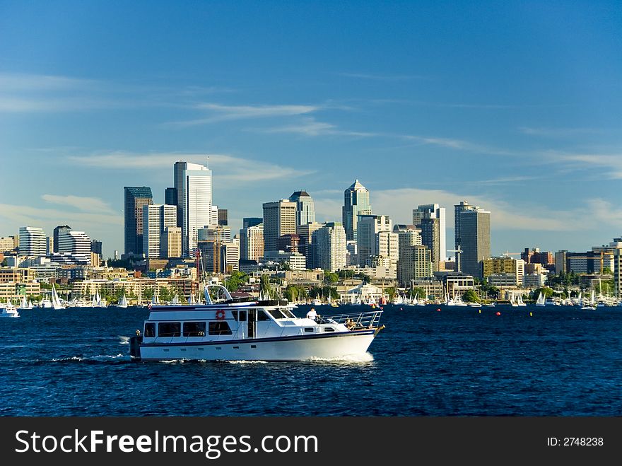 Nice motor yacht cruising on Lake Union in Seattle, WA. Nice motor yacht cruising on Lake Union in Seattle, WA