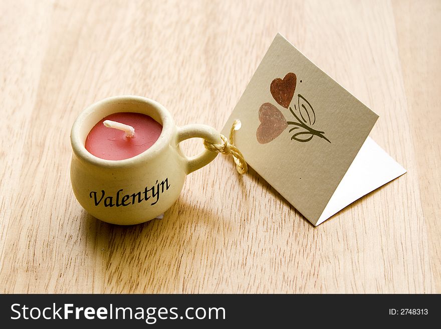 Valentine Candle with a greeting-card - close-up