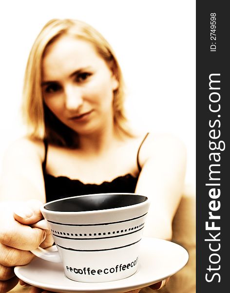 Blonde girl with coffee cup