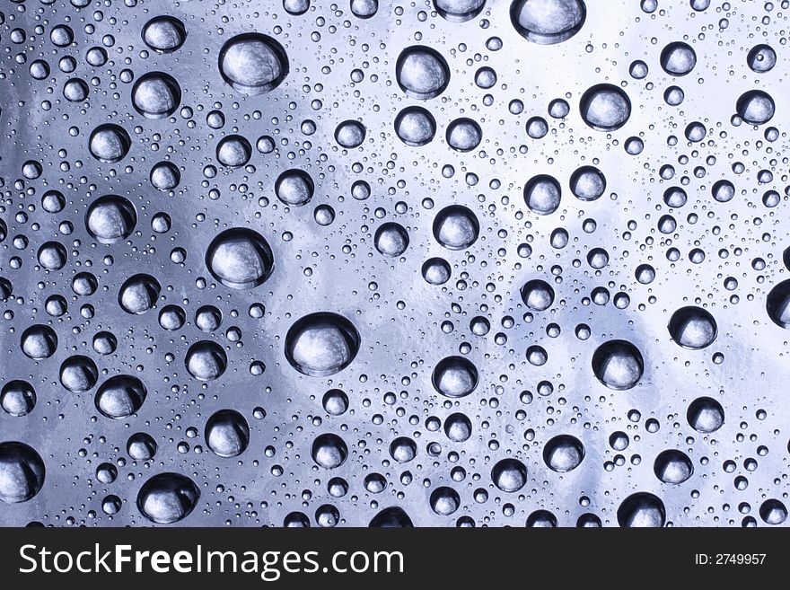 Drops of water on a reflecting surface