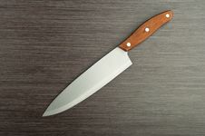 Kitchen Knife On  Wooden Background Stock Photos
