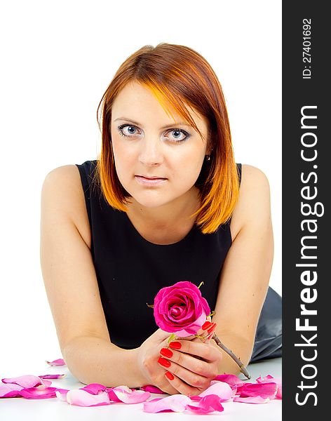 Portrait of a beautiful girl with a rose