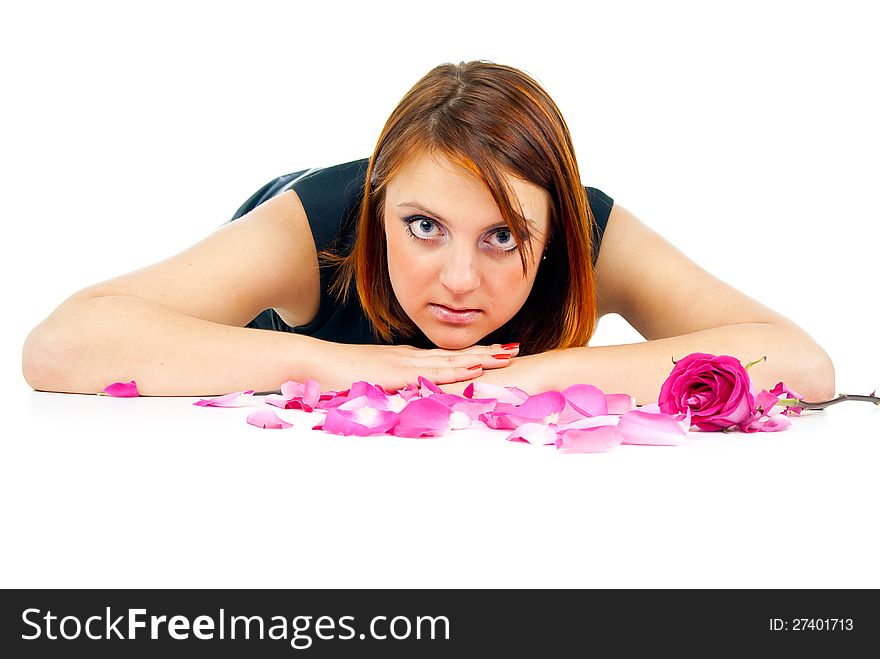 Beautiful girl with rose petals on white background