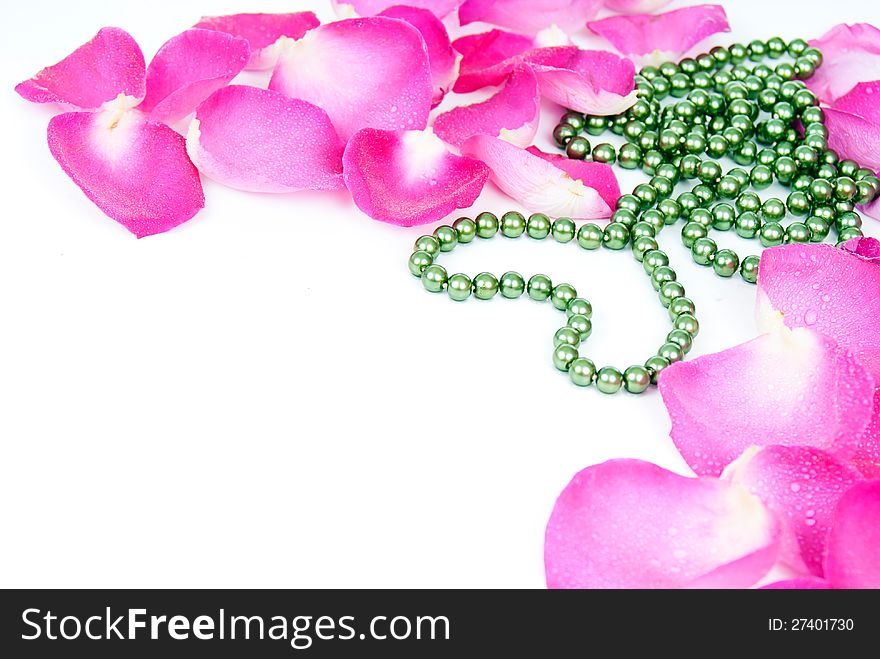 Background with rose petals and heart beaded. Background with rose petals and heart beaded