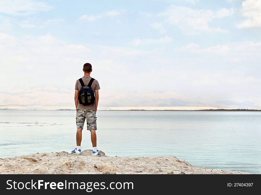 Traveler at the goal, the sea beach summer