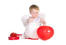 Boy Dressed As Angel With White And Red Balloons Stock Photo