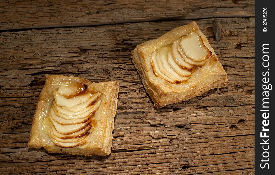 Delicious sliced apples on pastry food. Delicious sliced apples on pastry food