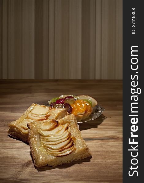 Delicious sliced apples on pastry food. Delicious sliced apples on pastry food