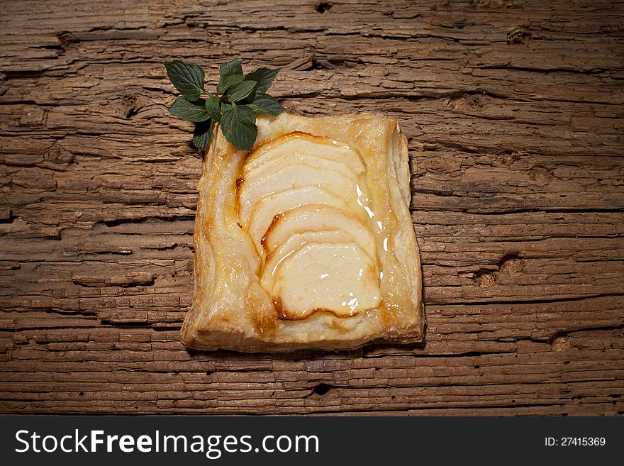 Delicious sliced apples on pastry food. Delicious sliced apples on pastry food