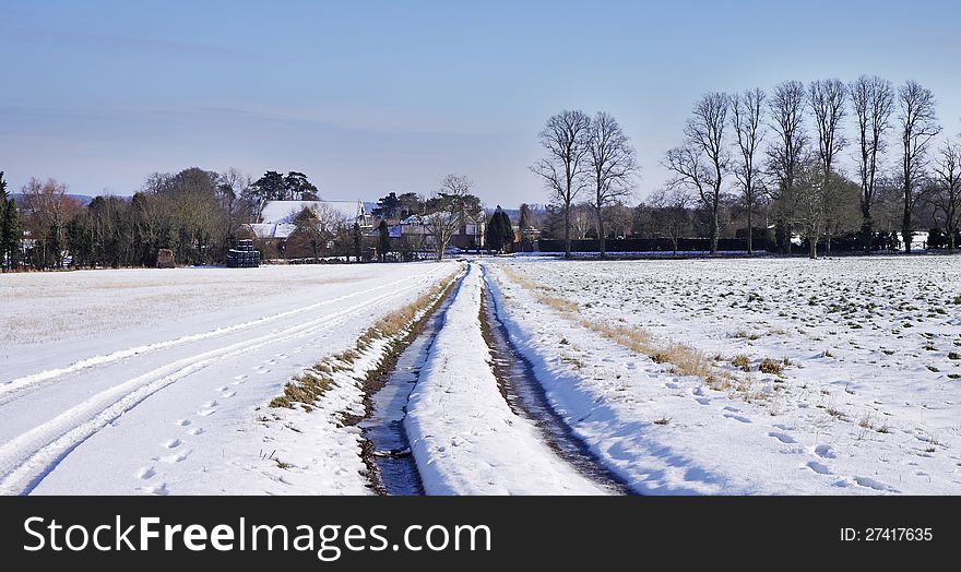 An English rural landscape in winter with Snow coverered fields. An English rural landscape in winter with Snow coverered fields