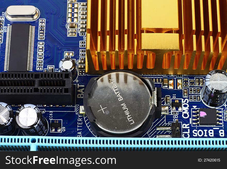 Digital hardware closeup. Microchips and condensers assembly on the circuit board macro. Digital hardware closeup. Microchips and condensers assembly on the circuit board macro