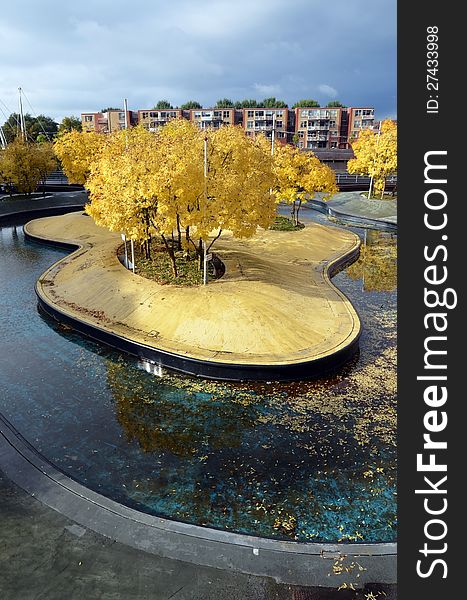 This image presents a beautiful public garden in the center of Almere, Holland. This image presents a beautiful public garden in the center of Almere, Holland