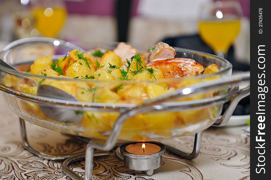 Baked potato with chicken white meat served on the table. Baked potato with chicken white meat served on the table