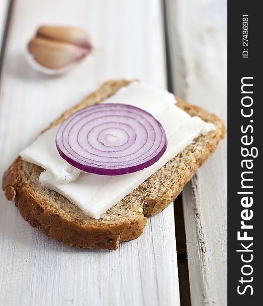 Slice of bread with lard and red onion. Slice of bread with lard and red onion