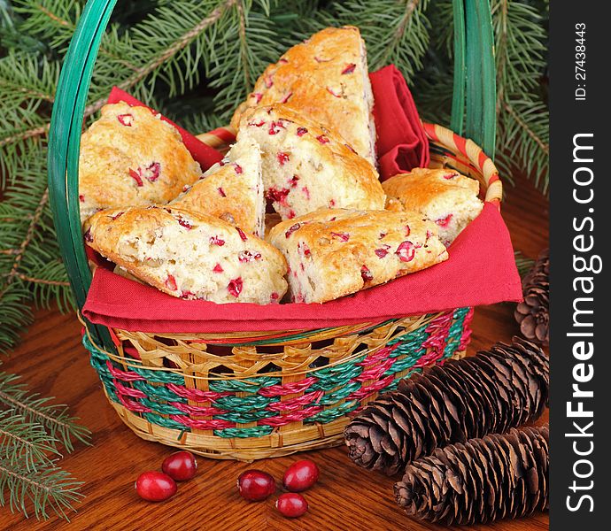 Cranberry and nut scones in a Christmas basket. Cranberry and nut scones in a Christmas basket
