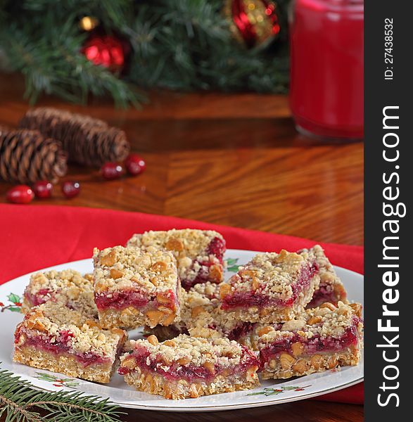 Plate of Christmas cranberry bars with peanut butter chips