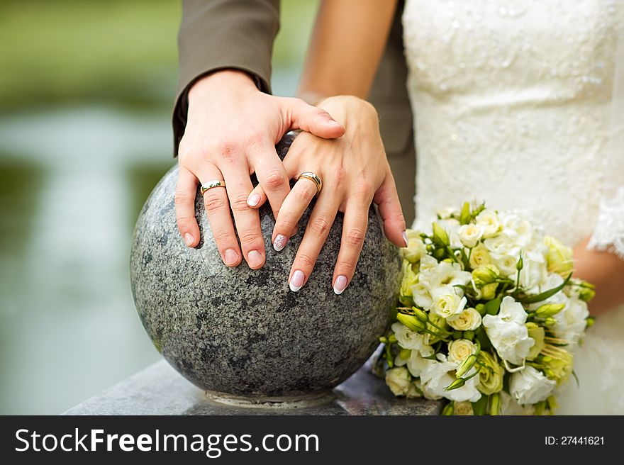 Wedding Rings And White Flowers