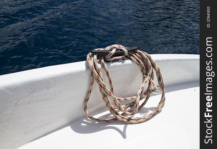 Closeup of a rope on the deck of a boat