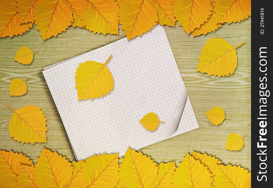 Yellow Leaves Over Wooden Background