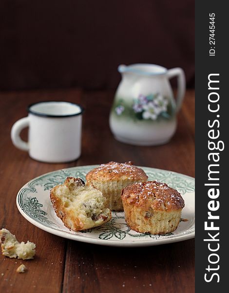 Homemade apple muffins and vintage rustic mug of milk. Homemade apple muffins and vintage rustic mug of milk