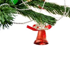 Christmas Bell And  On The Branch Of A Tree Stock Photos