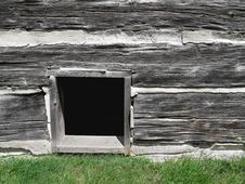 Basement Window In Old Log Building. Royalty Free Stock Photo Basement Window In Old Log Building. Royalty Free Stock Photo