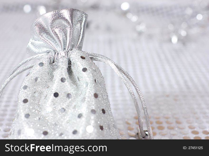 Christmas silver packing on shiny background