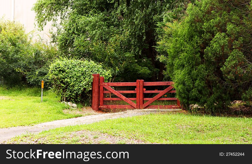 Beautiful red gate and trees surrounded