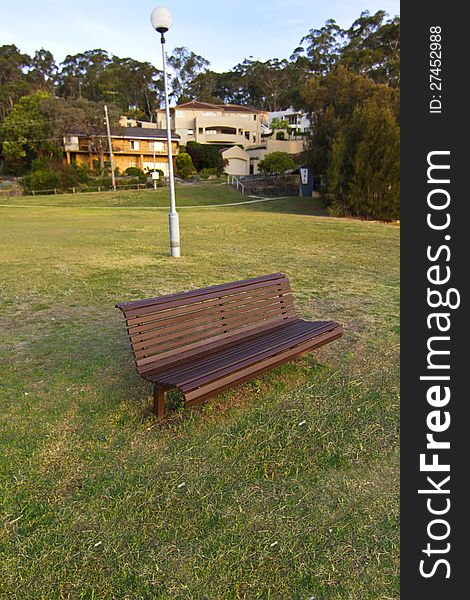 Park chair and lamb closer to residential properties.