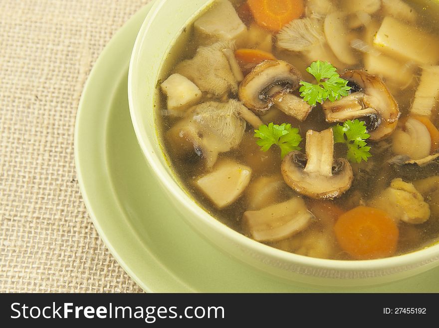 Mushrooms soup with carrots and onions. Mushrooms soup with carrots and onions