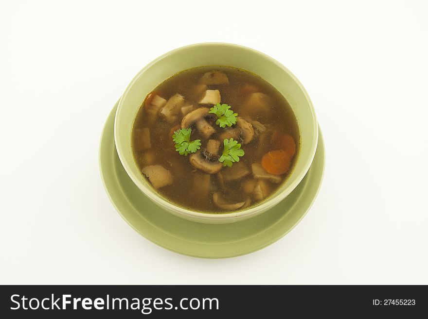 Mushrooms soup with carrot and onion