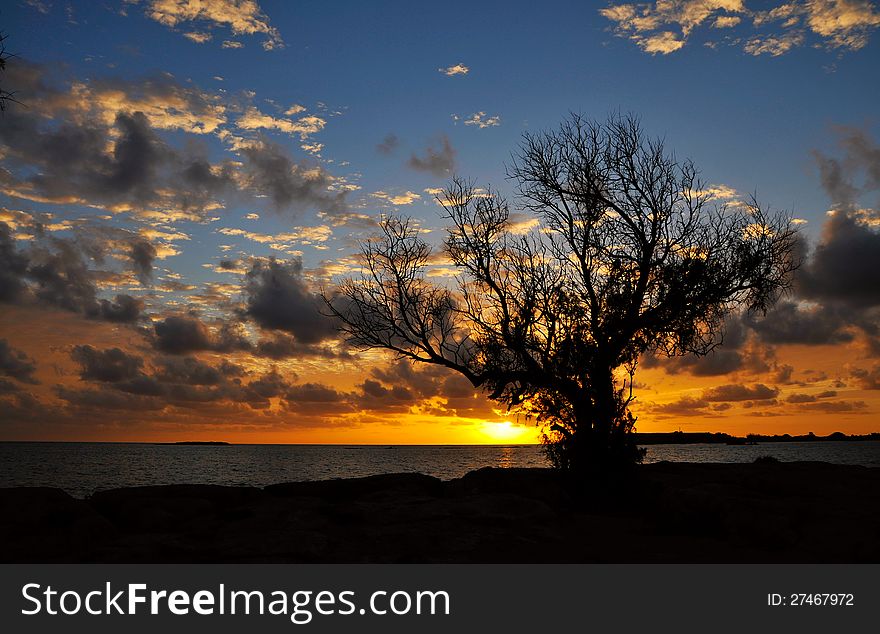 Beautiful sunset on the coast of Libian sea. Greece. Crete. Elafonisi