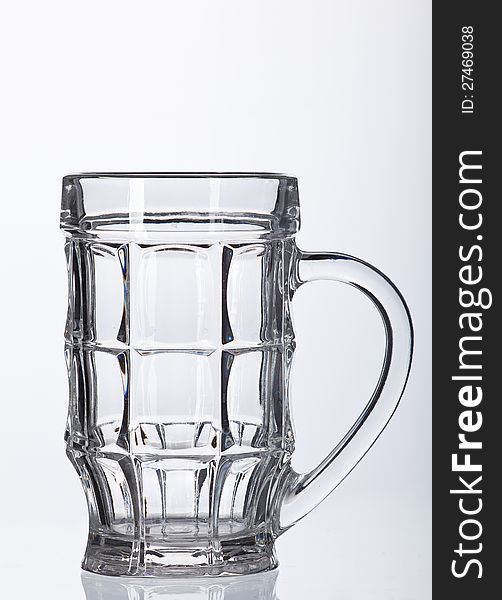 Empty beer glass  on white background