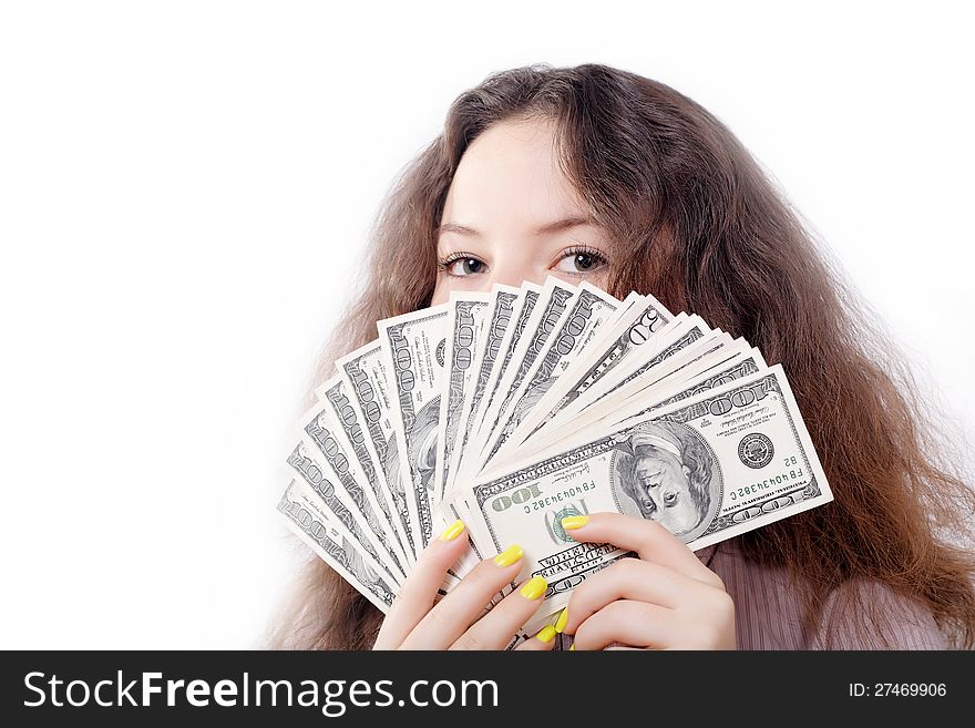 Portrait of a pretty brunette girl with money isolated