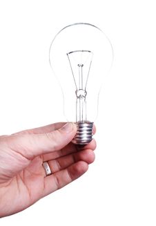 Bulb &x28;lamp&x29; In Hand, Isolated On White Stock Photo