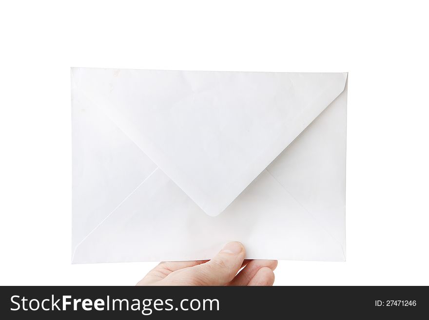 Envelope in the hand isolated on white background