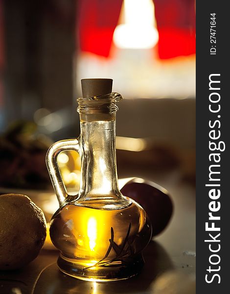 Bottle of a golden olive oil in restaurant