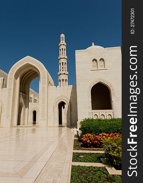 Outside areas at the Sultan Qaboos Grand Mosque in Muscat, Oman. The main minaret is visible in the background. Outside areas at the Sultan Qaboos Grand Mosque in Muscat, Oman. The main minaret is visible in the background.