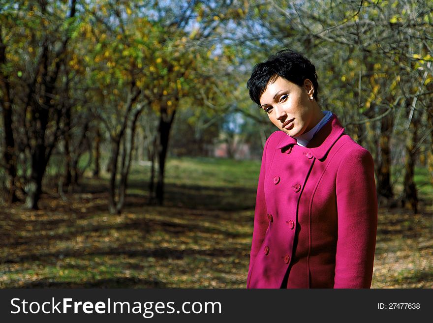 Young beautiful girl in nature background. Young beautiful girl in nature background