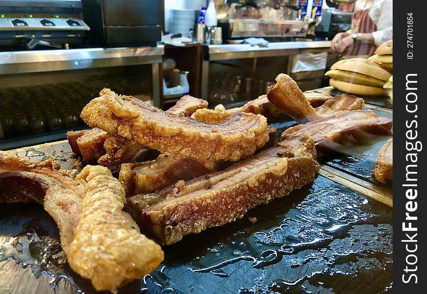 The Photograph Depicts A Plate Full Of Torreznos, Those Irresistible Pieces Of Pork Belly That Have Been Cooked Until They Reach A