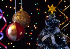 Two Christmas  Ball, Serpentine, Tree  On A Black Stock Photo