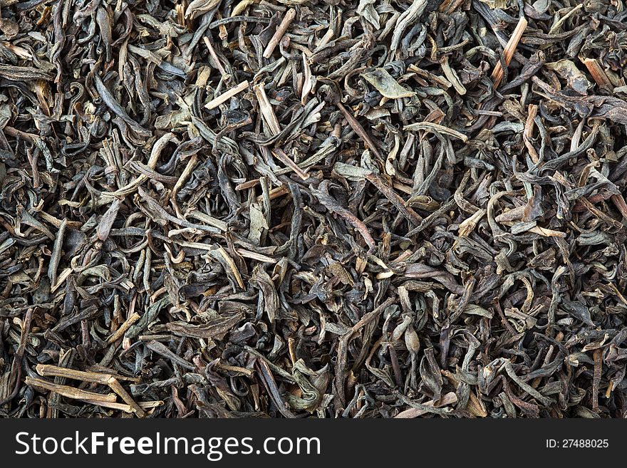 Dried green tea leaves, a delicious strong drink.