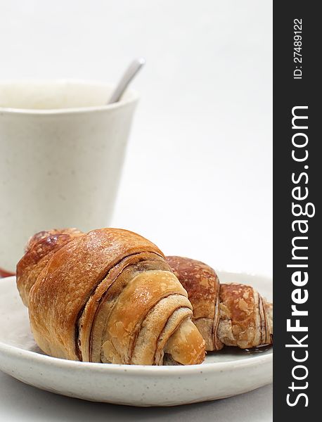 Mini croissants on white background