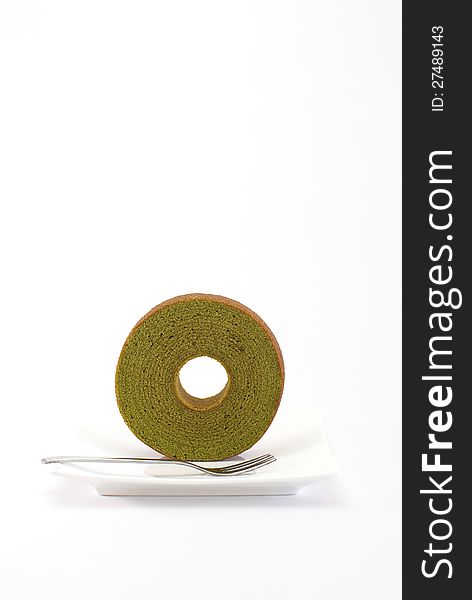 Sponge cake green tea isolated on white background. Sponge cake green tea isolated on white background