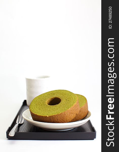 Sponge cake green tea isolated on white background