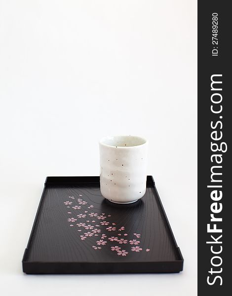 Coffee or tea mug with wood plate on white background. Coffee or tea mug with wood plate on white background